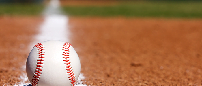 Baseball Sports Betting Picks - Baseball on the foul line chalk